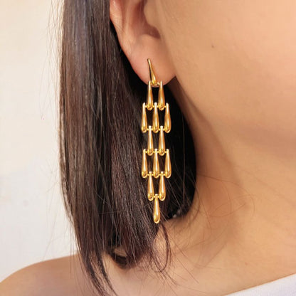 Cascading Gold Droplet Statement Earrings