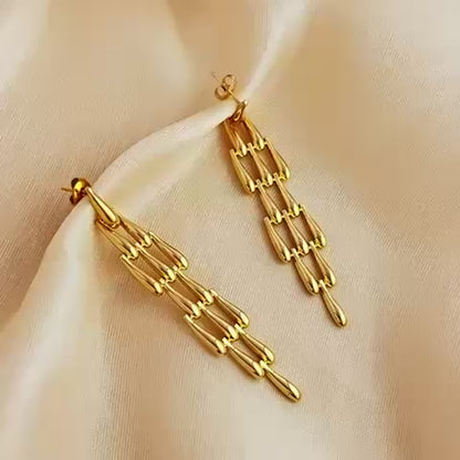 Cascading Gold Droplet Statement Earrings